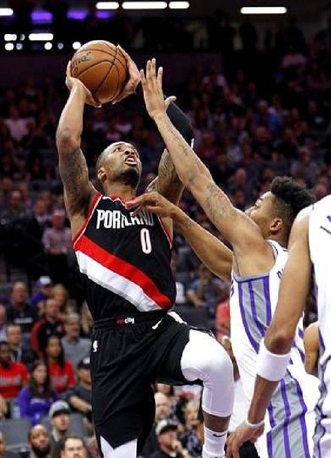 猛龙力克开拓者，利拉德孤军奋战无力回天。